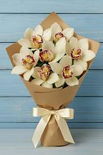 Букет 7 белых орхидей в Янтарном Букет цветов из:  Орхидеи и Розы в Янтарном